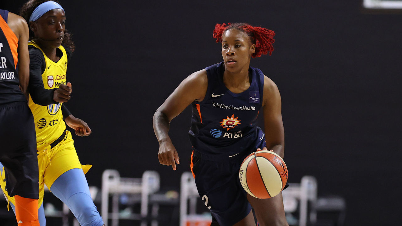 Orlando, FL - AUGUST 8: Bria Holmes #32 of the Connecticut Sun handles the ball against the Chicago Sky on August 8, 2020 at the Feld Entertainment Center in Palmetto, Florida. NOTE TO USER: User expressly acknowledges and agrees that, by downloading and/or using this Photograph, user is consenting to the terms and conditions of the Getty Images License Agreement. Mandatory Copyright Notice: Copyright 2020 NBAE