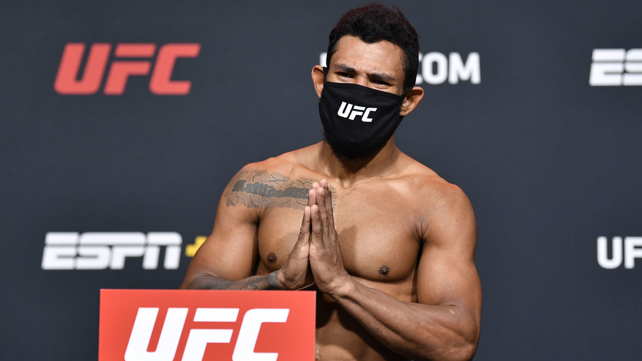 LAS VEGAS, NEVADA - FEBRUARY 19: Rafael Alves of Brazil poses on the scale during the UFC weigh-in at UFC APEX on February 19, 2021 in Las Vegas, Nevada.