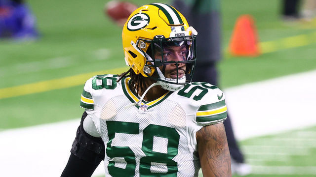 DETROIT, MICHIGAN - DECEMBER 13: Christian Kirksey #58 of the Green Bay Packers warms up before the game against the Detroit Lions at Ford Field on December 13, 2020 in Detroit, Michigan.