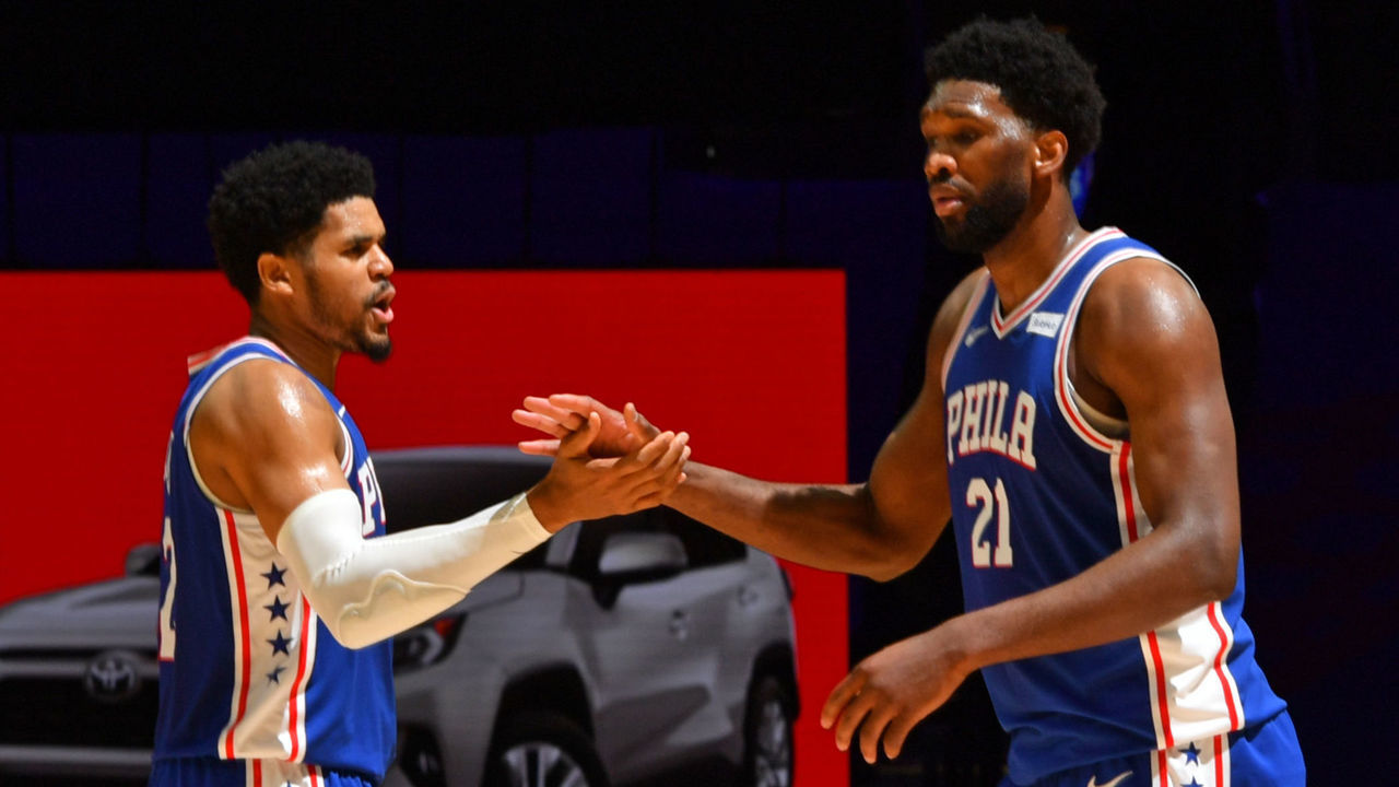 PHILADELPHIA, PA - FEBRUARY 19: Tobias Harris #12 of the Philadelphia 76ers and Joel Embiid #21 of the Philadelphia 76ers high-five during a game against the Chicago Bulls on February 19, 2021 at Wells Fargo Center in Philadelphia, Pennsylvania. NOTE TO USER: User expressly acknowledges and agrees that, by downloading and/or using this Photograph, user is consenting to the terms and conditions of the Getty Images License Agreement. Mandatory Copyright Notice: Copyright 2021 NBAE