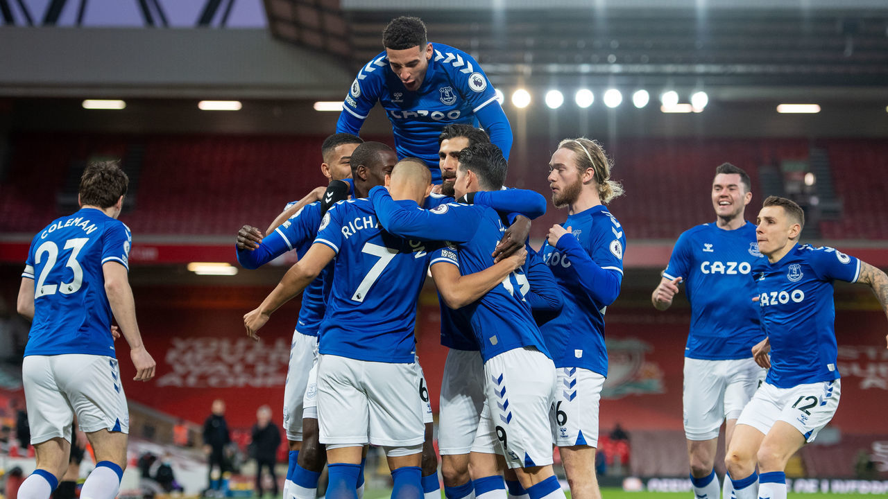 LIVERPOOL, ENGLAND - FEBRUARY 20: Richarlison of Everton celebrates scoring his teams first goal with team mates during the Premier League match between Liverpool and Everton at Anfield on February 20, 2021 in Liverpool, England. Sporting stadiums around the UK remain under strict restrictions due to the Coronavirus Pandemic as Government social distancing laws prohibit fans inside venues resulting in games being played behind closed doors.