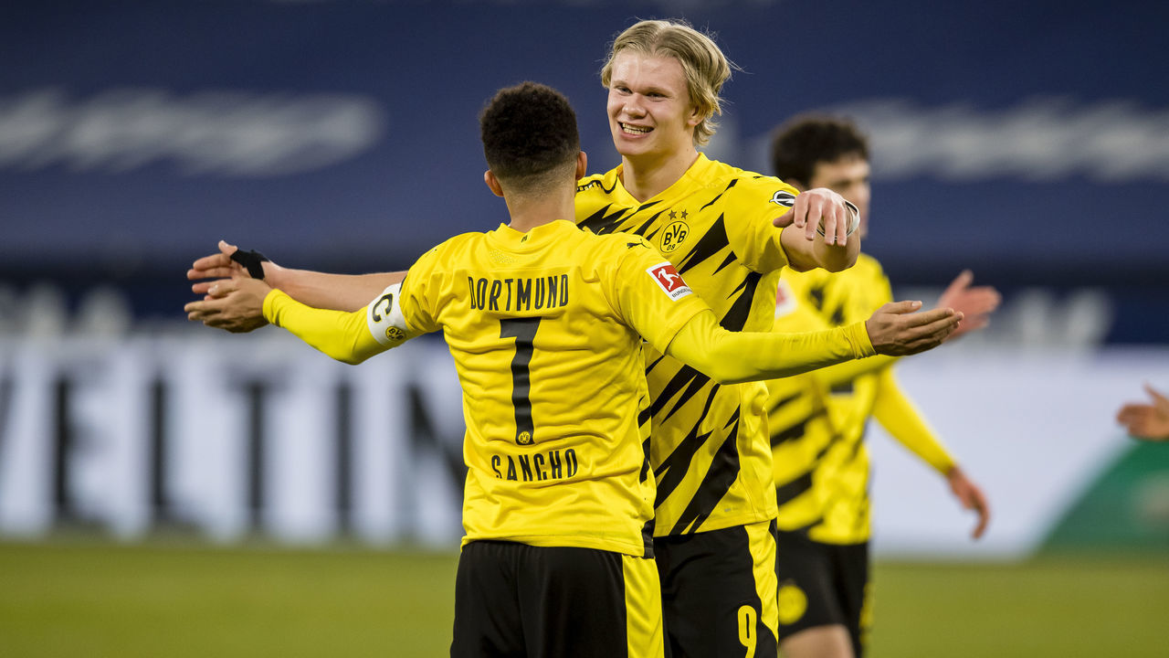 GELSENKIRCHEN, GERMANY - FEBRUARY 20: Jadon Sancho and of Borussia Dortmund celebrate the win after the final whistle during the Bundesliga match between FC Schalke 04 and Borussia Dortmund at the Veltins Arena on February 20, 2021 in Gelsenkirchen, Germany.