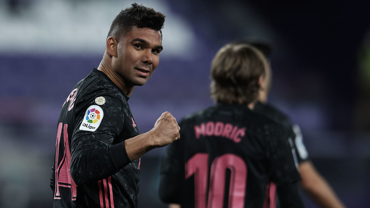 Casemiro of Real Madrid celebrates after scoring his sides first goal during the La Liga Santander match between Real Valladolid CF and Real Madrid at Estadio Municipal Jose Zorrilla on February 20, 2021 in Valladolid, Spain. Sporting stadiums around Spain remain under strict restrictions due to the Coronavirus Pandemic as Government social distancing laws prohibit fans inside venues resulting in games being played behind closed doors.