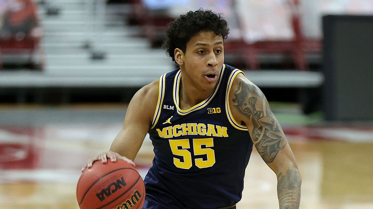 MADISON, WISCONSIN - FEBRUARY 14: Eli Brooks #55 of the Michigan Wolverines drives to the basket during the first half against the Wisconsin Badgers at Kohl Center on February 14, 2021 in Madison, Wisconsin.
