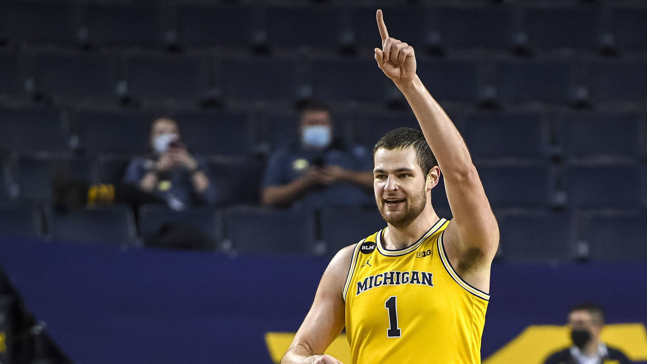 ANN ARBOR, MICHIGAN - JANUARY 06: Hunter Dickinson #1 of the Michigan Wolverines reacts after a dunk against the Minnesota Golden Gophers during the first half at Crisler Arena on January 06, 2021 in Ann Arbor, Michigan.