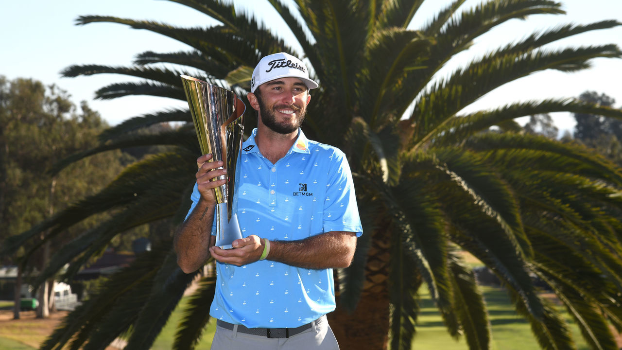 PACIFIC PALISADES, CALIFORNIA - FEBRUARY 21: Max Homa of the United States poses with the trophy after defeating Tony Finau of the United States (not pictured) in a playoff to win The Genesis Invitational at Riviera Country Club on February 21, 2021 in Pacific Palisades, California.