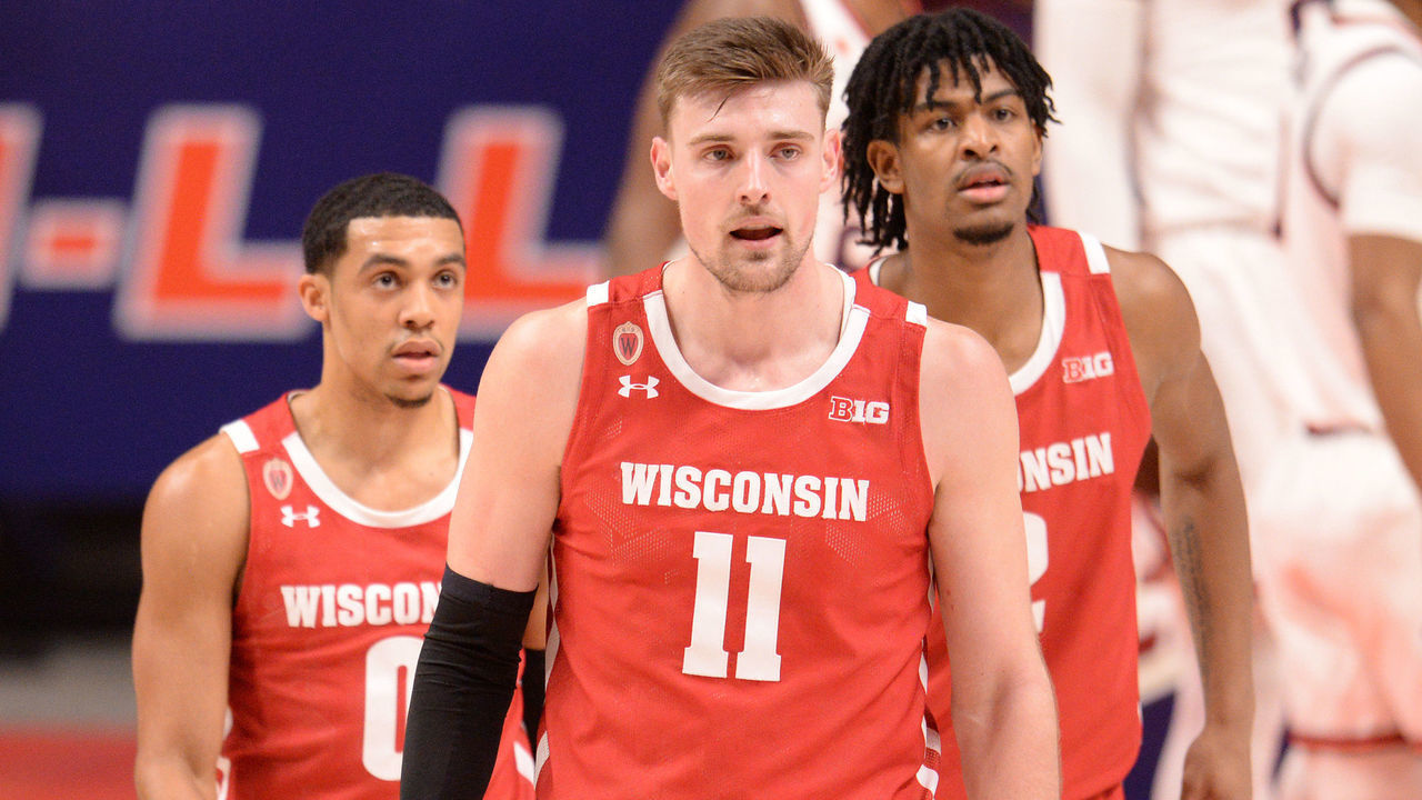 CHAMPAIGN, IL - FEBRUARY 06: Wisconsin Badgers forward Micah Potter (11) walks across the court during the Big Ten Conference college basketball game between the Wisconsin Badgers and the Illinois Fighting Illini on February 6, 2021, at the Stat Farm Center in Champaign, Illinois.