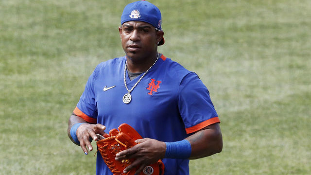 NEW YORK, NEW YORK - JULY 14: (NEW YORK DAILIES OUT) Yoenis Cespedes #52 of the New York Mets walks on the field during summer workouts at Citi Field on July 14, 2020 in New York City.