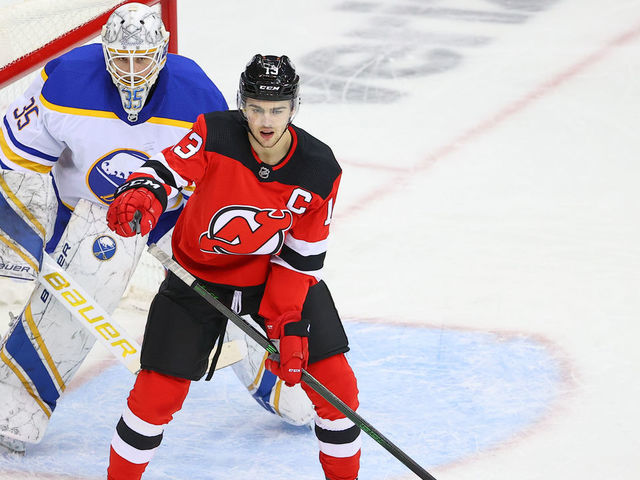 NEWARK, NJ - FEBRUARY 20: New Jersey Devils center Nico Hischier (13) sets upin front of Buffalo Sabres goaltender Linus Ullmark (35) during the National Hockey League game between the New Jersey Devils and the Buffalo Sabres on February 20, 2021 at the Prudential Center in Newark, NJ.