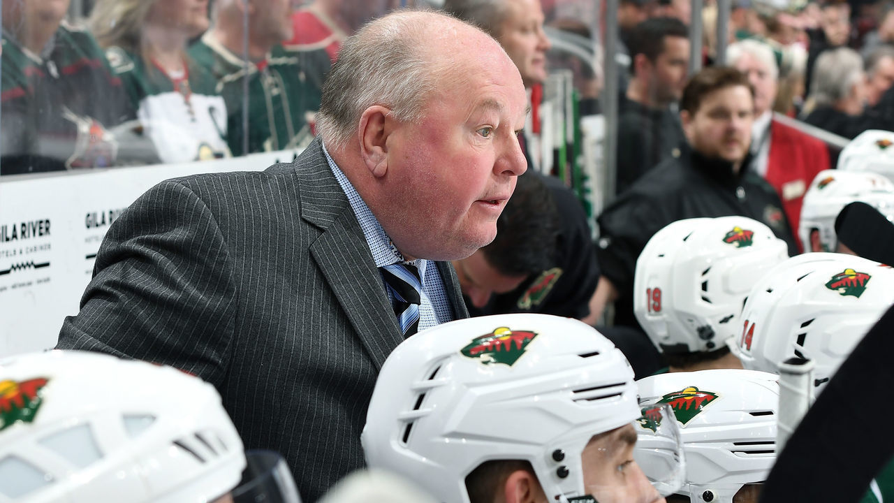 GLENDALE, AZ - MARCH 31: Head coach Bruce Boudreau of the Minnesota Wild looks on from the bench during first period action against the Arizona Coyotes at Gila River Arena on March 31, 2019 in Glendale, Arizona.