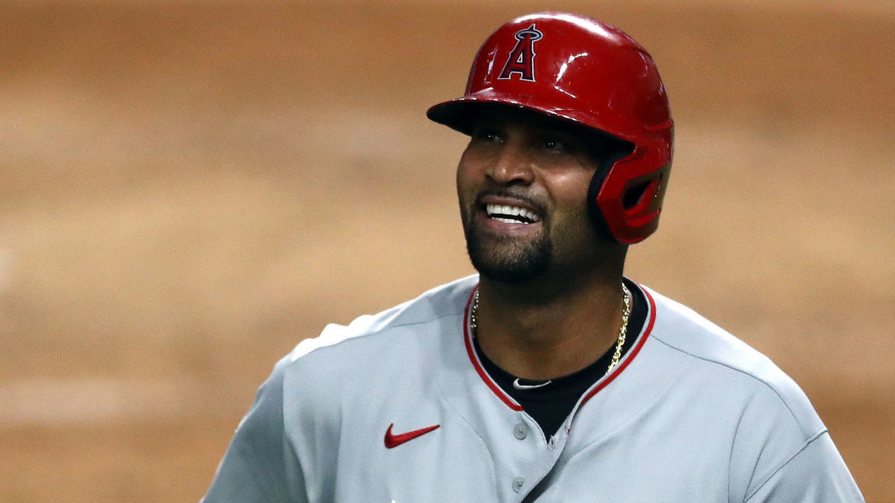 ARLINGTON, TEXAS - AUGUST 07: Albert Pujols #5 of the Los Angeles Angels celebrates a run in the fourth inning against the Texas Rangers at Globe Life Field on August 07, 2020 in Arlington, Texas.
