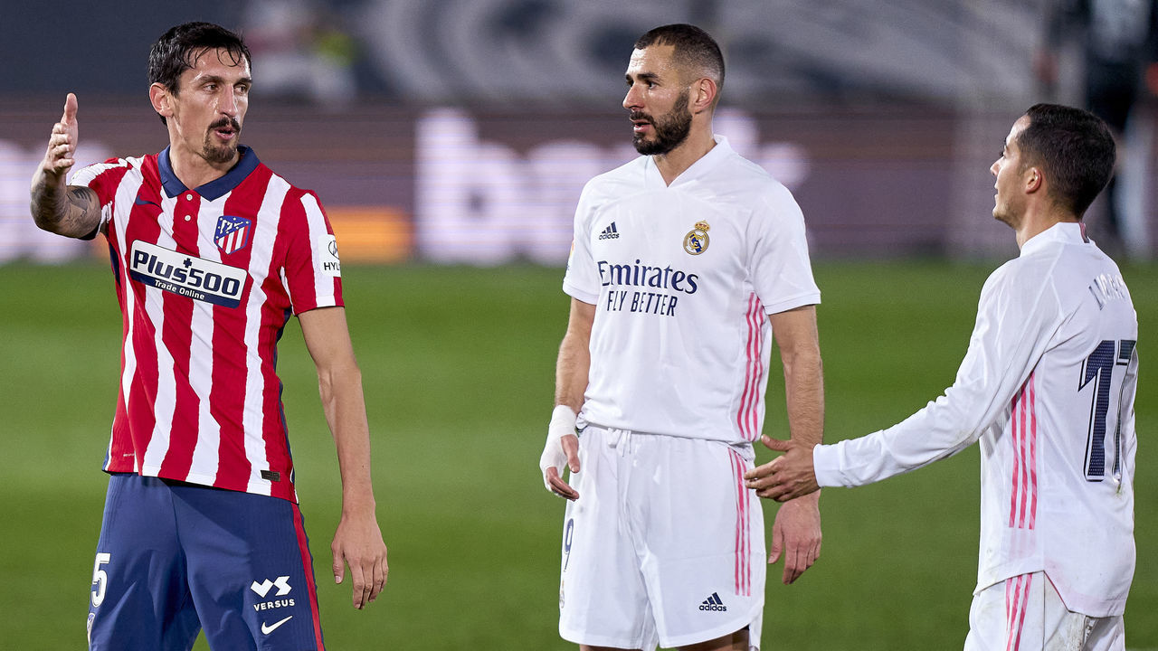MADRID, SPAIN - DECEMBER 12: Lucas Vazquez of Real Madrid argue with Stefan Savic of Atletico de Madrid during the La Liga Santander match between Real Madrid and Atletico de Madrid at Estadio Alfredo Di Stefano on December 12, 2020 in Madrid, Spain.