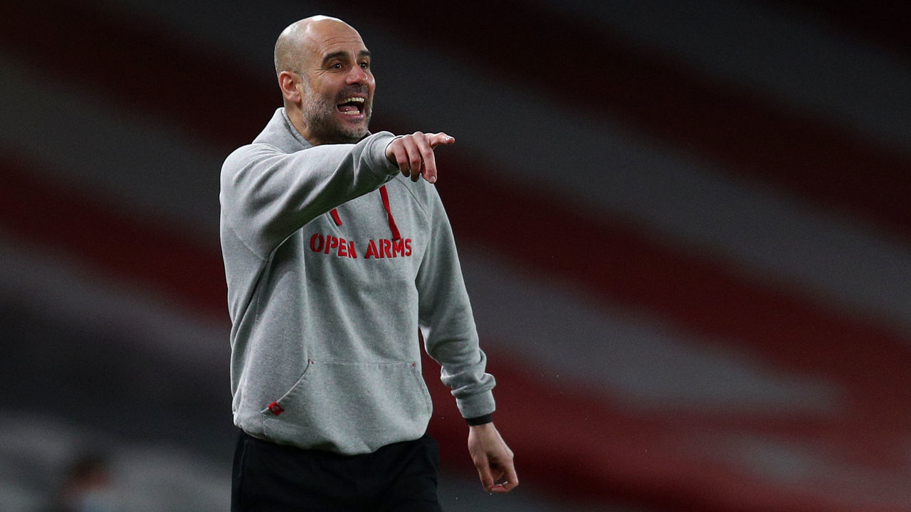 LONDON, ENGLAND - FEBRUARY 21: Pep Guardiola, Manager of Manchester City reacts during the Premier League match between Arsenal and Manchester City at Emirates Stadium on February 21, 2021 in London, England. Sporting stadiums around the UK remain under strict restrictions due to the Coronavirus Pandemic as Government social distancing laws prohibit fans inside venues resulting in games being played behind closed doors.
