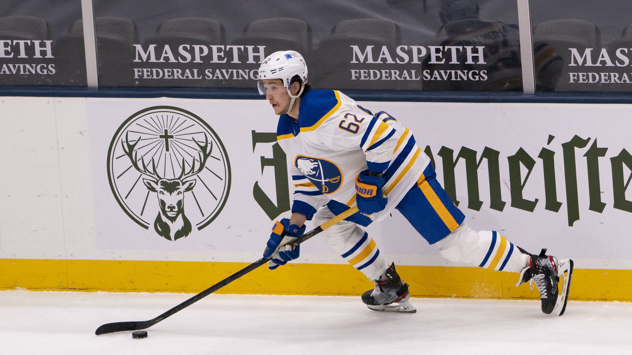 UNIONDALE, NY - FEBRUARY 22: Buffalo Sabres Defenseman Brandon Montour (62) skates with the puck during the first period of the National Hockey League game between the Buffalo Sabres and the New York Islanders on February 22, 2021, at the Nassau Veterans Memorial Coliseum in Uniondale, NY.
