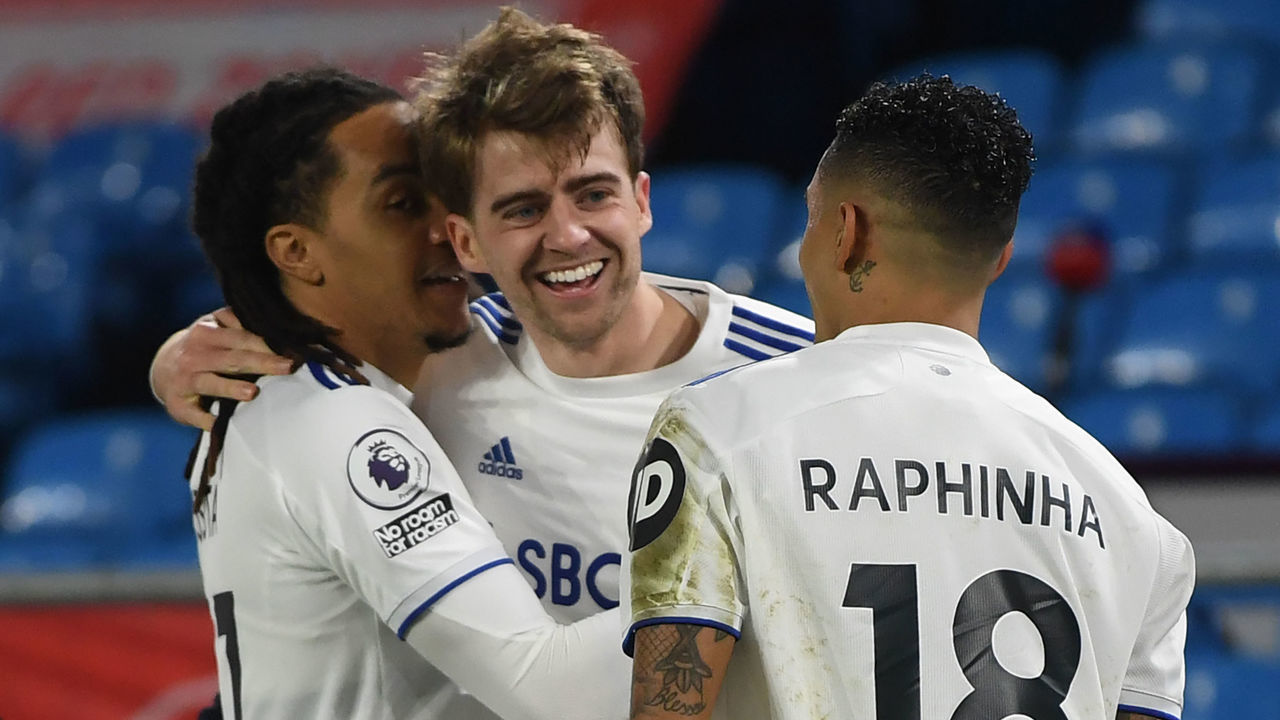 Leeds United's English striker Patrick Bamford (C) celebrates with teammates after he scores his team's opening goal during the English Premier League football match between Leeds United and Southampton at Elland Road in Leeds, northern England on February 23, 2021.