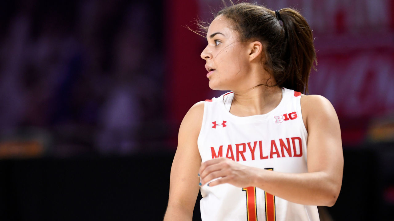COLLEGE PARK, MD - FEBRUARY 04: Katie Benzan #11 of the Maryland Terrapins plays against the Wisconsin Badgers at Xfinity Center on February 4, 2021 in College Park, Maryland.