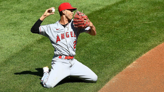 DENVER, CO - SEPTEMBER 13: Los Angeles Angels of Anaheim shortstop Andrelton Simmons (2) makes a throw from his knees after fielding a ground ball against the Colorado Rockies during a game at Coors Field in Denver, Colorado on September 13, 2020.