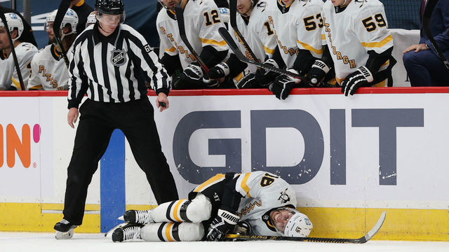WASHINGTON, DC - FEBRUARY 23: Jason Zucker #16 of the Pittsburgh Penguins lays on the ice injured against the Washington Capitals during the third period at Capital One Arena on February 23, 2021 in Washington, DC.