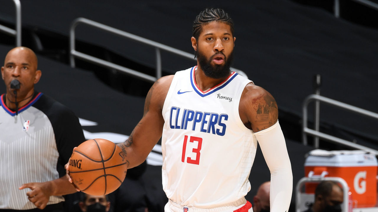 LOS ANGELES, CA - FEBRUARY 23: Paul George #13 of the LA Clippers handles the ball during the game against the Washington Wizards on February 23, 2021 at STAPLES Center in Los Angeles, California. NOTE TO USER: User expressly acknowledges and agrees that, by downloading and/or using this Photograph, user is consenting to the terms and conditions of the Getty Images License Agreement. Mandatory Copyright Notice: Copyright 2021 NBAE