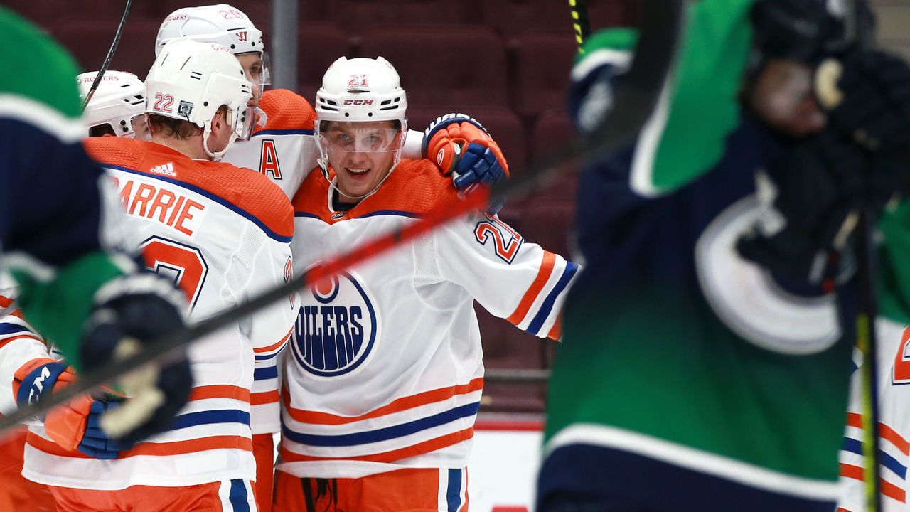 VANCOUVER, BC - FEBRUARY 23: The Edmonton Oilers celebrate a goal by Edmonton Oilers Center Dominik Kahun (21) against the Vancouver Canucks during their NHL game at Rogers Arena on February 23, 2021 in Vancouver, British Columbia, Canada.