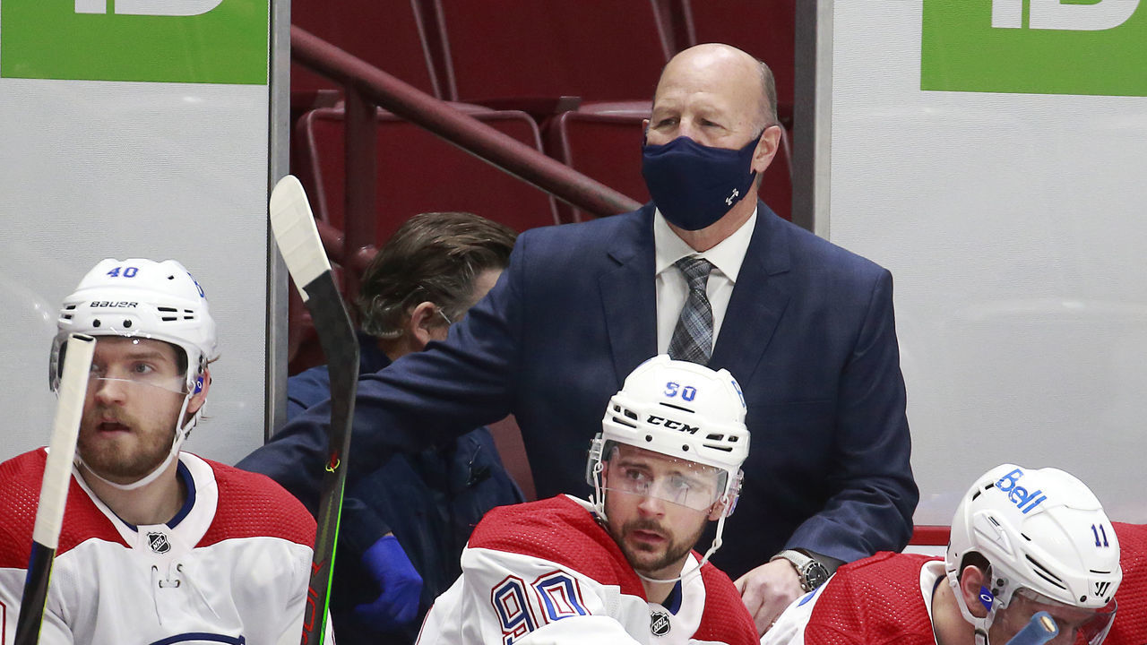 VANCOUVER, BC - JANUARY 20: Head coach Claude Julien of the Montreal Canadiens looks on from the bench during their NHL game against the Vancouver Canucks at Rogers Arena January 20, 2021 in Vancouver, British Columbia, Canada. "n