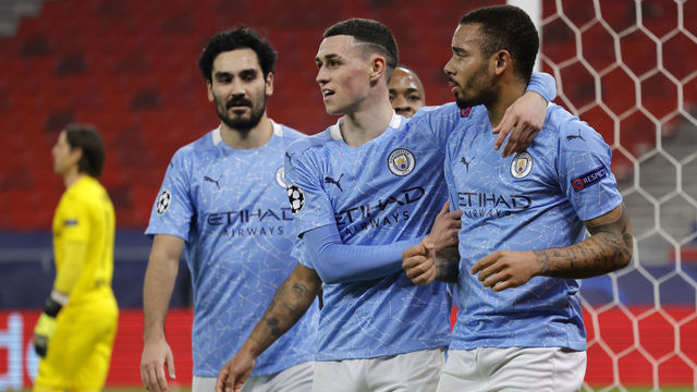 BUDAPEST, HUNGARY - FEBRUARY 24: Gabriel Jesus of Manchester City celebrates with Phil Foden after scoring their team's second goal during the UEFA Champions League Round of 16 match between Borussia Moenchengladbach and Manchester City at Puskas Arena on February 24, 2021 in Budapest, Hungary. Sporting stadiums around Europe remain under strict restrictions due to the Coronavirus Pandemic as Government social distancing laws prohibit fans inside venues resulting in games being played behind closed doors.