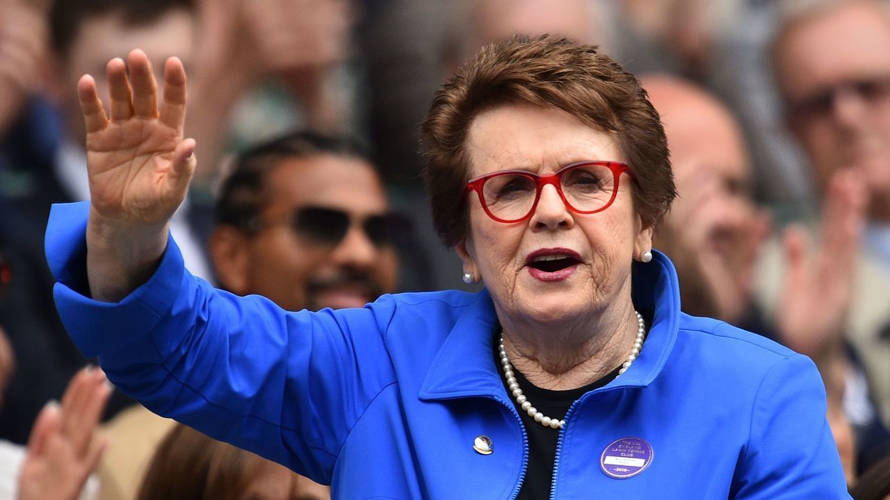 US former tennis player Billie Jean King waves as she is presented in the Royal Box on Centre Court at The All England Tennis Club in Wimbledon, southwest London, on July 6, 2019, on the sixth day of the 2019 Wimbledon Championships tennis tournament.