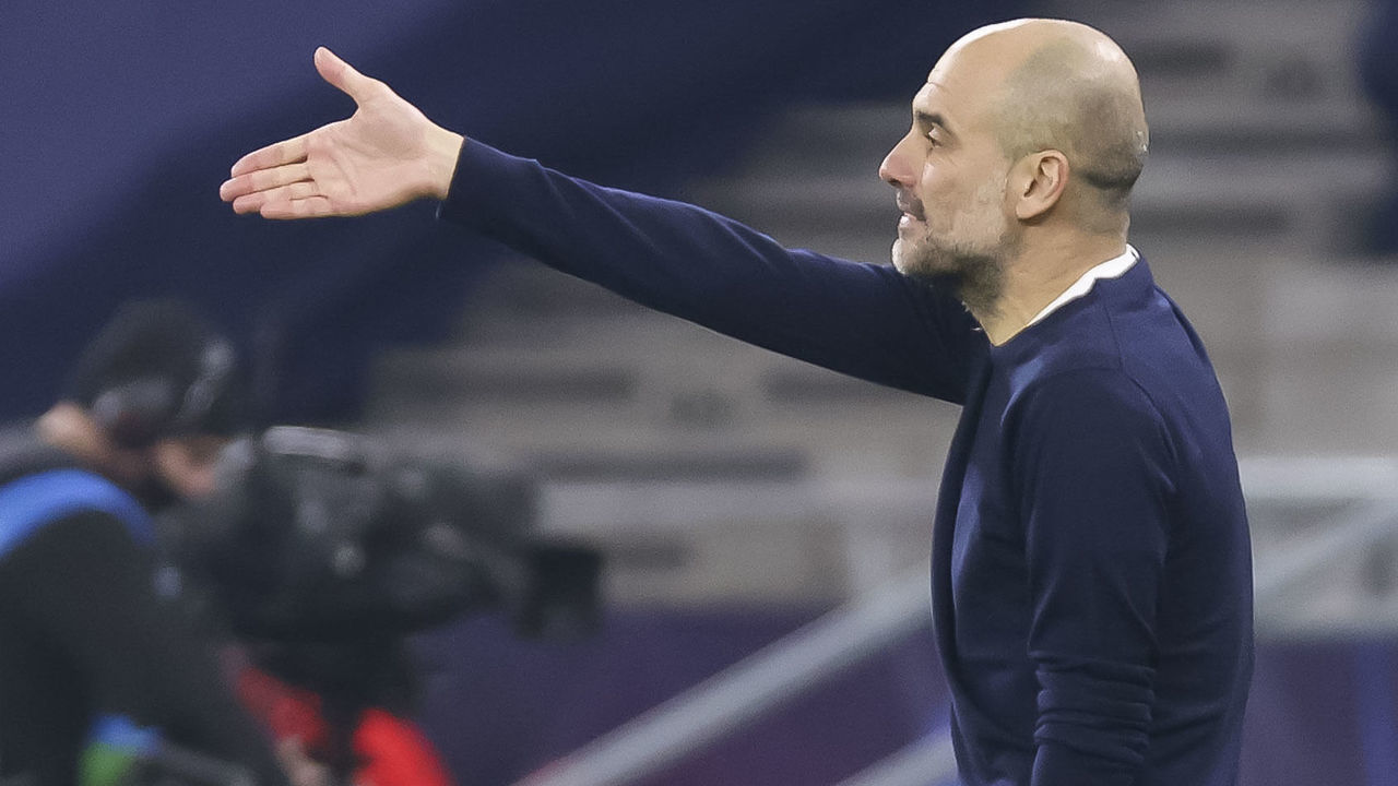 BUDAPEST, HUNGARY - FEBRUARY 24: (BILD ZEITUNG OUT) head coach Pep Guardiola of Manchester City gestures during the UEFA Champions League Round of 16 match between Borussia Moenchengladbach and Manchester City at Puskas Arena on February 24, 2021 in Budapest, Hungary.