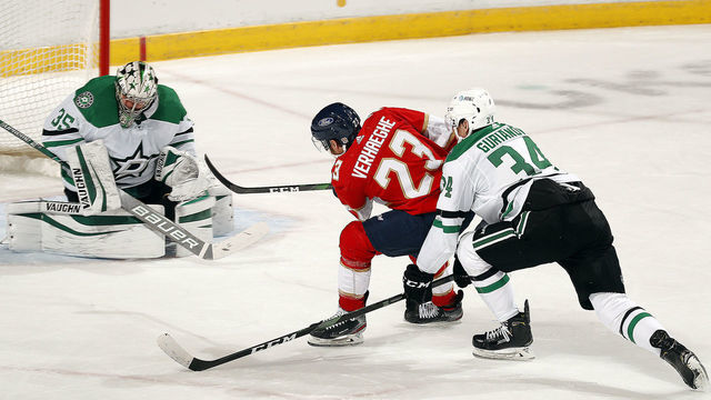 SUNRISE, FL - FEBRUARY 24: Carter Verhaeghe #23 of the Florida Panthers takes a shot on Goaltender Anton Khudobin #35 of the Dallas Stars during first period action at the BB&T Center on February 24, 2021 in Sunrise, Florida.