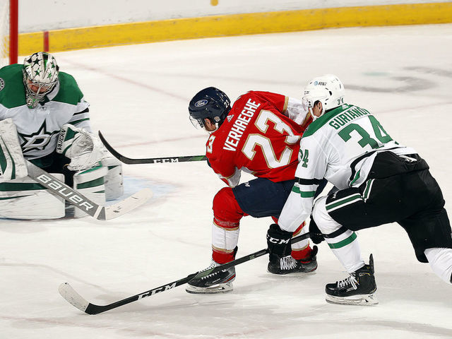 SUNRISE, FL - FEBRUARY 24: Carter Verhaeghe #23 of the Florida Panthers takes a shot on Goaltender Anton Khudobin #35 of the Dallas Stars during first period action at the BB&T Center on February 24, 2021 in Sunrise, Florida.