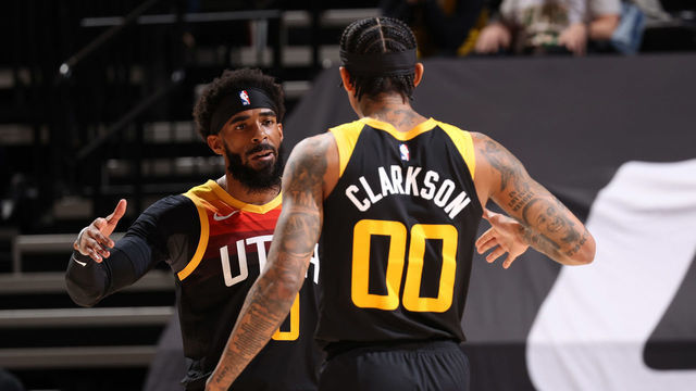SALT LAKE CITY, UT - FEBRUARY 24: Mike Conley #10 and Jordan Clarkson #00 of the Utah Jazz hi-five during the game against the Los Angeles Lakers on February 24, 2021 at vivint.SmartHome Arena in Salt Lake City, Utah. Mandatory Copyright Notice: Copyright 2021 NBAE