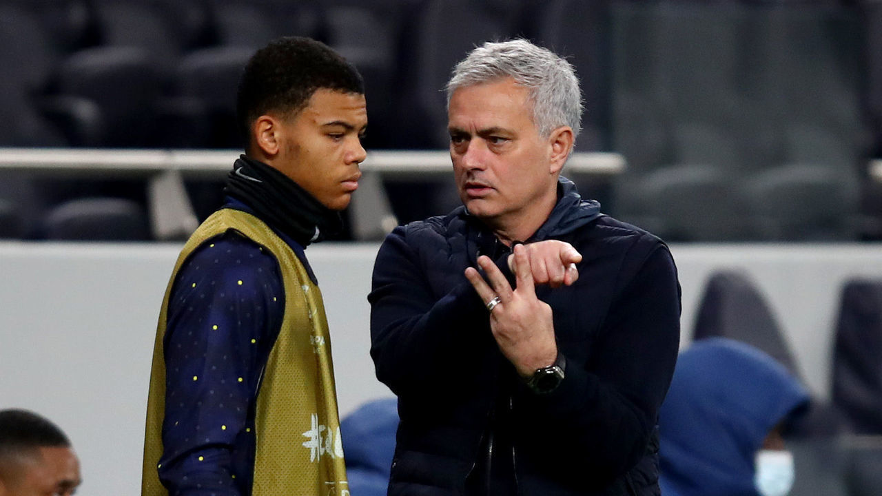 LONDON, ENGLAND - FEBRUARY 24: Jose Mourinho, Manager of Tottenham Hotspur interacts with Dane Scarlett of Tottenham Hotspur during the UEFA Europa League Round of 32 match between Tottenham Hotspur and Wolfsberger AC at The Tottenham Hotspur Stadium on February 24, 2021 in London, England. Sporting stadiums around the UK remain under strict restrictions due to the Coronavirus Pandemic as Government social distancing laws prohibit fans inside venues resulting in games being played behind closed doors.