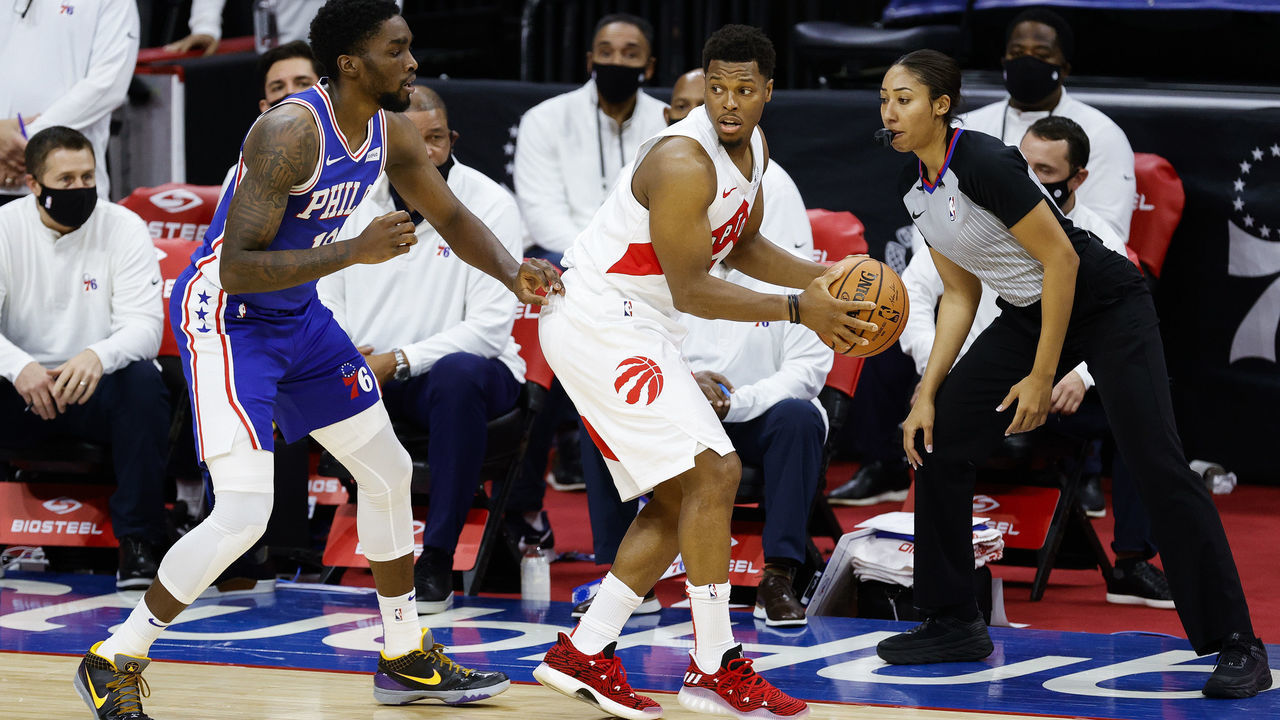 PHILADELPHIA, PENNSYLVANIA - DECEMBER 29: Kyle Lowry #7 of the Toronto Raptors is guarded by Shake Milton #18 of the Philadelphia 76ers during the fourth quarter at Wells Fargo Center on December 29, 2020 in Philadelphia, Pennsylvania.
