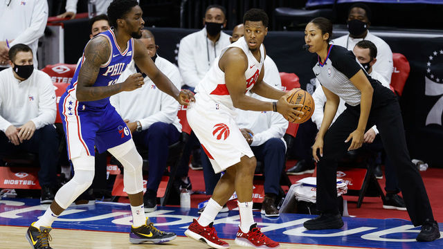 PHILADELPHIA, PENNSYLVANIA - DECEMBER 29: Kyle Lowry #7 of the Toronto Raptors is guarded by Shake Milton #18 of the Philadelphia 76ers during the fourth quarter at Wells Fargo Center on December 29, 2020 in Philadelphia, Pennsylvania.