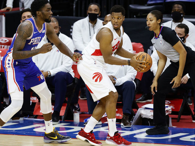 PHILADELPHIA, PENNSYLVANIA - DECEMBER 29: Kyle Lowry #7 of the Toronto Raptors is guarded by Shake Milton #18 of the Philadelphia 76ers during the fourth quarter at Wells Fargo Center on December 29, 2020 in Philadelphia, Pennsylvania.