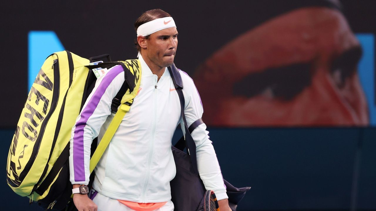 MELBOURNE, Feb. 17, 2021 -- Rafael Nadal walks onto the court before the men's singles quarterfinal match between Rafael Nadal of Spain and Stefanos Tsitsipas of Greece at Australian Open in Melbourne Park, in Melbourne, Australia, on Feb. 17, 2021.