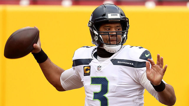 LANDOVER, MARYLAND - DECEMBER 20: Quarterback Russell Wilson #3 of the Seattle Seahawks looks to pass against the Washington Football Team in the first half at FedExField on December 20, 2020 in Landover, Maryland.