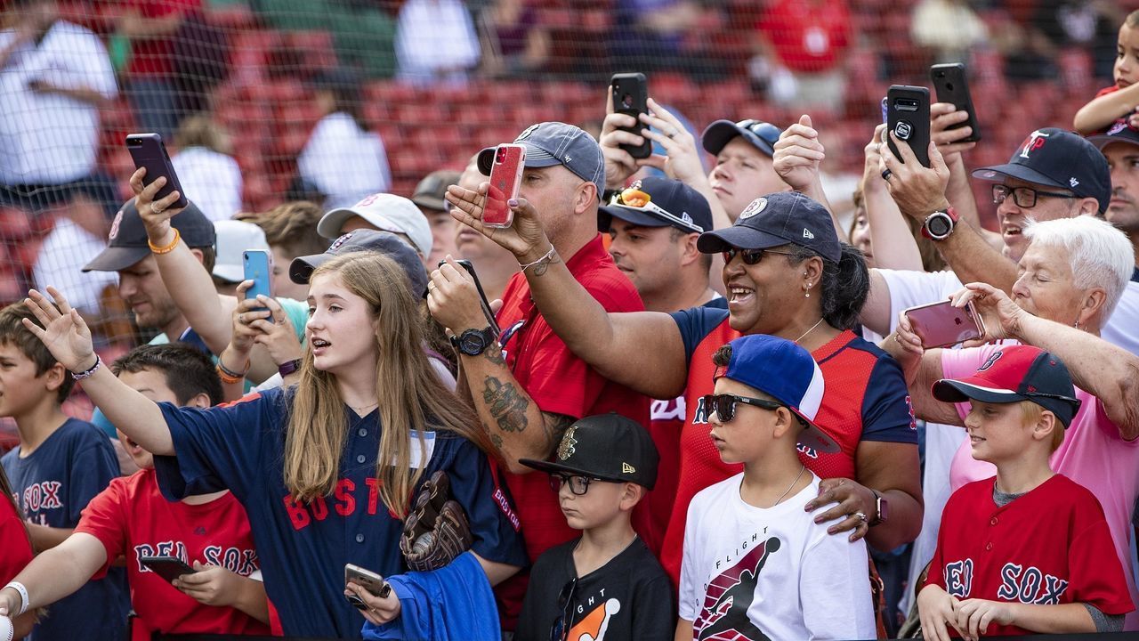 BOSTON, MA - SEPTEMBER 29: Fans take photographs before a game between the Boston Red Sox and the Baltimore Orioles on September 29, 2019 at Fenway Park in Boston, Massachusetts.