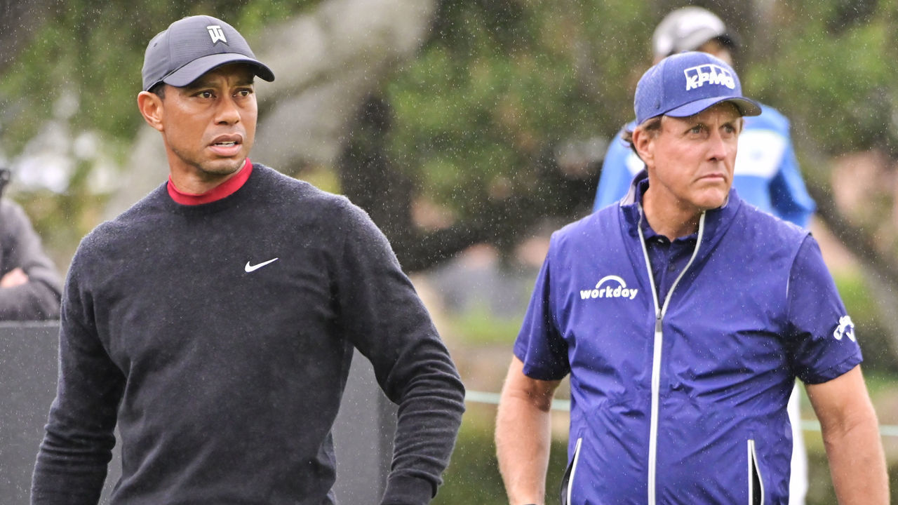 THOUSAND OAKS, CA - OCTOBER 25: Tiger Woods watches his tee shot on the 10th hole while Phil Mickelson gets ready to hit during the final round of the ZOZO Championship at Sherwood Country Club on October 25, 2020 in Thousand Oaks, California.