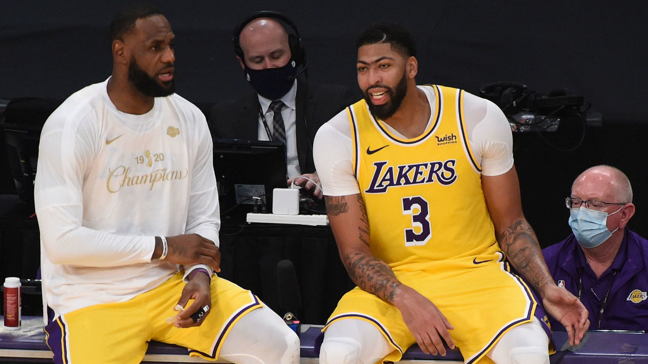 LOS ANGELES, CA - DECEMBER 22: LeBron James #23 and Anthony Davis #3 of the Los Angeles Lakers share a conversation during a game against the LA Clippers on December 22, 2020 at STAPLES Center in Los Angeles, California. NOTE TO USER: User expressly acknowledges and agrees that, by downloading and/or using this Photograph, user is consenting to the terms and conditions of the Getty Images License Agreement. Mandatory Copyright Notice: Copyright 2020 NBAE