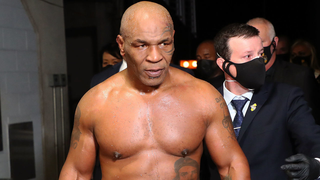 LOS ANGELES, CALIFORNIA - NOVEMBER 28: Mike Tyson exits the ring after receiving a split draw against Roy Jones Jr. during Mike Tyson vs Roy Jones Jr. presented by Triller at Staples Center on November 28, 2020 in Los Angeles, California.