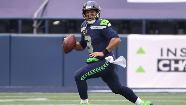 SEATTLE, WASHINGTON - JANUARY 09: Quarterback Russell Wilson #3 of the Seattle Seahawks drops back to pass during the second quarter of the NFC Wild Card Playoff game against the Los Angeles Rams at Lumen Field on January 09, 2021 in Seattle, Washington.