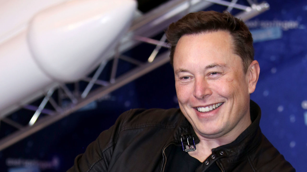 Elon Musk, founder of SpaceX and chief executive officer of Tesla Inc., arrives at the Axel Springer Award ceremony in Berlin, Germany, on Tuesday, Dec. 1, 2020. Tesla Inc. will be added to the S&P 500 Index in one shot on Dec. 21, a move that will ripple through the entire market as money managers adjust their portfolios to make room for shares of the $538 billion company. Photographer: Liesa Johannssen-Koppitz/Bloomberg via Getty Images