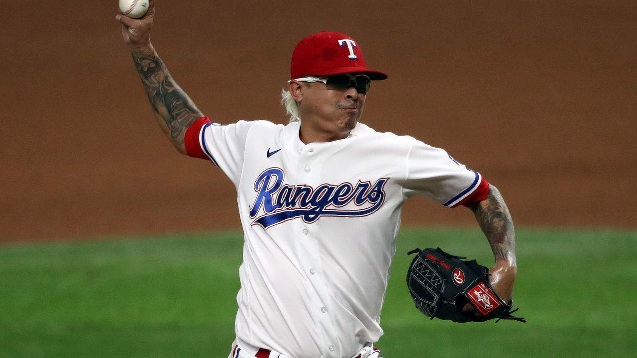 ARLINGTON, TEXAS - AUGUST 10: Jesse Chavez #30 of the Texas Rangers throws against the Seattle Mariners in the seventh inning at Globe Life Field on August 10, 2020 in Arlington, Texas.