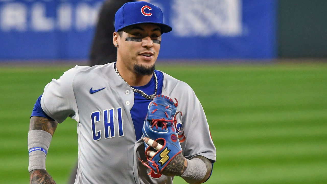 CHICAGO, IL - SEPTEMBER 26: Chicago Cubs infielder Javier Baez (9) heads to the dugout at the end of an inning during a Major League Baseball game between the Chicago White Sox and Chicago Cubs on September 26, 2020, at Guaranteed Rate Field, Chicago, IL.