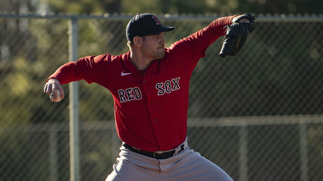 FT. MYERS, FL - FEBRUARY 24: Adam Ottavino #0 of the Boston Red Sox throws during the MGM Sox at Sundown spring training team night workout on February 24, 2021 at jetBlue Park at Fenway South in Fort Myers, Florida.