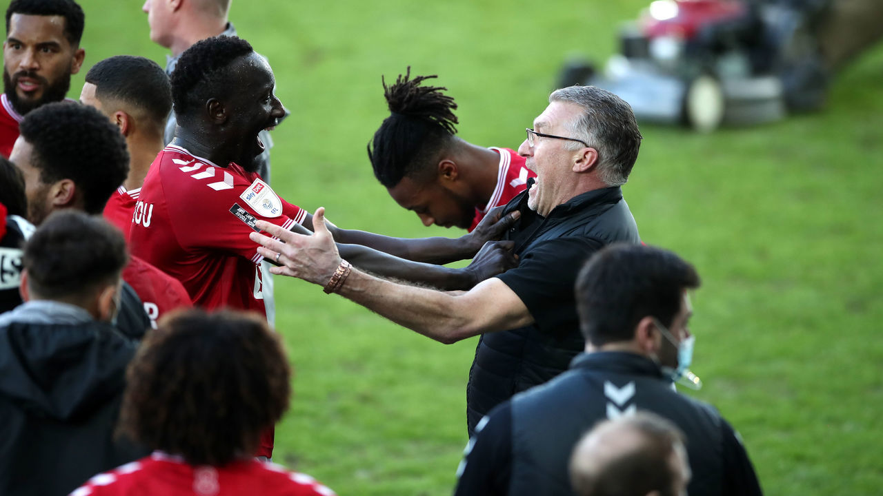 Bristol City manager Nigel Pearson (right) celebrates with Famara Diedhiou after the Sky Bet Championship match at the Liberty Stadium, Swansea. Picture date: Saturday February 27, 2021.