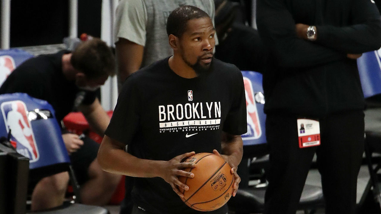 LOS ANGELES, CALIFORNIA - FEBRUARY 21: Kevin Durant #7 of the Brooklyn Nets looks on during warm ups before the game against the Los Angeles Clippers at Staples Center on February 21, 2021 in Los Angeles, California.