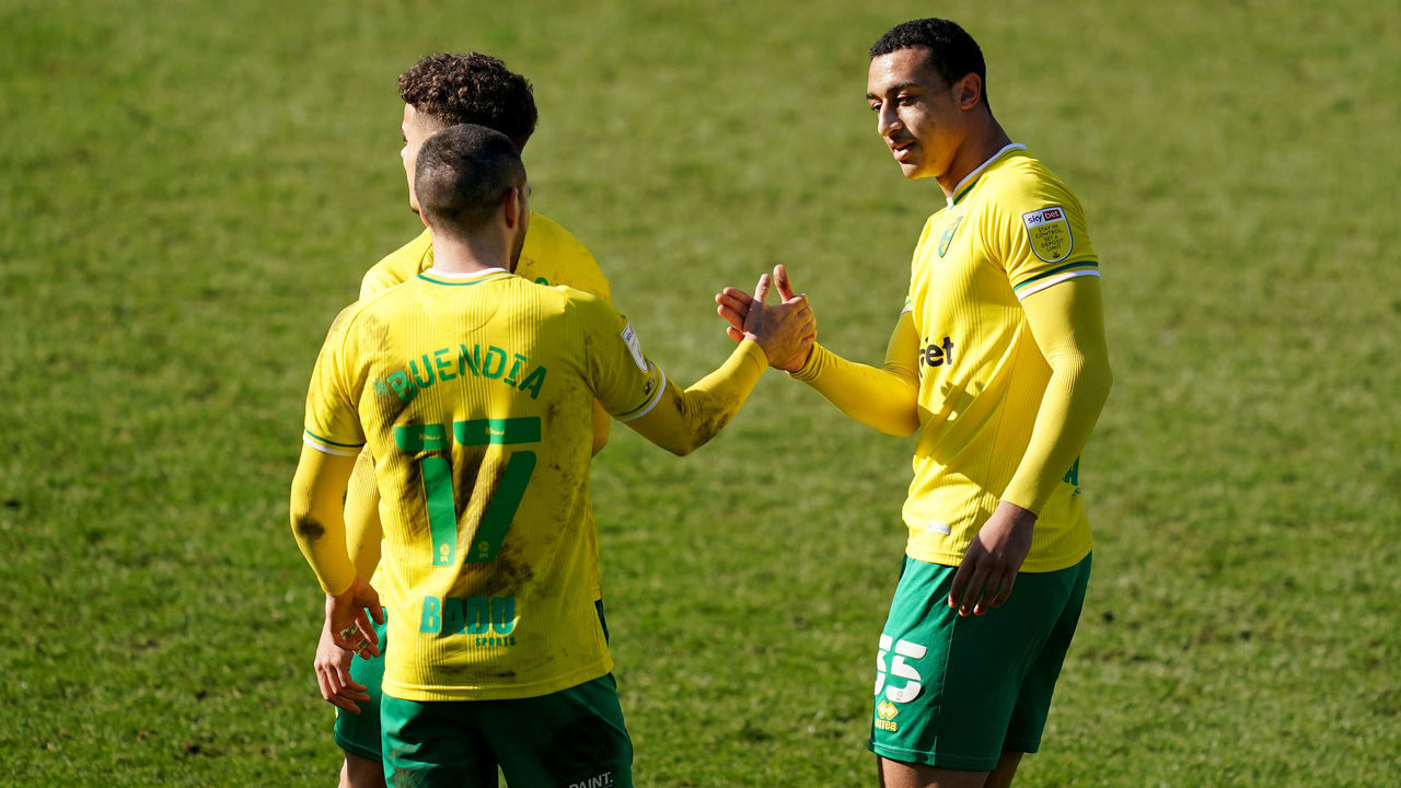 Norwich City's Adam Idah (right) celebrates scoring their second goal with teammates during the Sky Bet Championship match at Adams Park, Wycombe. Picture date: Sunday February 28, 2021.