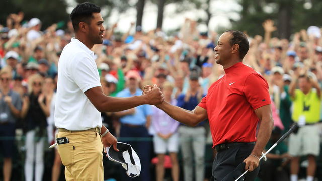 AUGUSTA, GEORGIA - APRIL 14: (L-R) Tony Finau of the United States congratulates Tiger Woods of the United States on his win on the 18th green during the final round of the Masters at Augusta National Golf Club on April 14, 2019 in Augusta, Georgia.